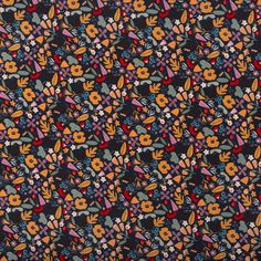 an orange and blue floral pattern on a black background