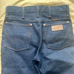 These Are Brand New Wrangler Jeans, Selling Because They Don’t Fit! It Says 28 But They Fit More Like A 26/27 Waist Western Style Denim Blue Bottoms With Pockets, Western Denim Blue Bottoms With Pockets, Fitted Denim Blue Bottoms For Rodeo, Dark Wash Cotton Bottoms For Rodeo, Western Style Denim Blue Cotton Bottoms, Denim Blue Straight Leg Bottoms For Rodeo, Fitted Denim Blue Western Bottoms, Fitted Western Denim Blue Bottoms, Fitted Western Style Denim Blue Bottoms