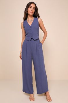 From SoHo to Spain, the Lulus Suits You Perfectly Dark Blue Linen Vest is a stylish look that's sure to get you noticed! Lightweight, linen-blend fabric shapes this chic, vest-style top that has a functional five-button placket at the front and finishes with cropped, angled hems. Pair with the matching pants for a complete look! Fit: This garment fits true to size. Length: Size medium measures 19.75" from shoulder to hem. Bust: Great for any cup size. Waist: Loosely Fitted. Undergarments: May be Blue Linen Wide-leg Pants, Blue Linen Wide-leg Bottoms, Vest Top Outfits, V-neck Linen Vest For Summer, Blue Button-up Cotton Vest, V-neck Linen Summer Vest, Blue Linen Pants, Wineries Outfit, White Linen Shirt