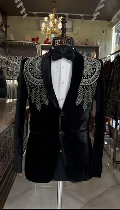 *3 Piece Black Velvet, Shawl Lapel with Silver Embroidery Men'sTuxedo , Groom Tuxedo Suit. *Fabric: %100 Velvet, Cotton, Thick, Warm, Comfortable, Breathable, Softer, Satin Feeling *Center 1 Button Blazer ,With Zipper Fly Pants. *This Suit Has A 6" Drop Which Is The Difference Between The Size Of The Sherwani & Pants. For Example, A 40r Jacket Includes A 34W Pant *Dry Clean Only Important Note: All Our Products Are Made To Order ! Please Contact Us For Perfect Fitting Suit. .Full Lining Tuxedo S Taksido Suit For Groom, Festive Black Blazer With Suit Collar, Festive Black Blazer For Groom, Black Slim Fit Long Sleeve Sets, Embroidered Fitted Tuxedo With Long Sleeves, Black Long Sleeve Tuxedo For Festive Occasions, Embroidered Fitted Long Sleeve Tuxedo, Black Embroidered Long Sleeve Suit, Tailored Black Embroidered Suits