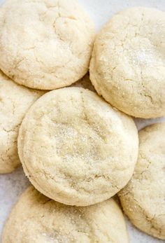 a pile of sugar cookies sitting on top of a table