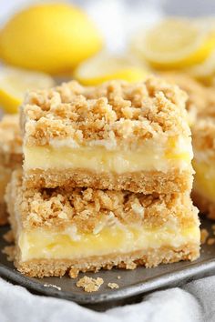 three lemon crumb bars stacked on top of each other