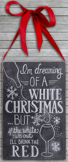 a chalkboard sign that says i'm dreaming of a white christmas but if the wine is out, i'll drink the red