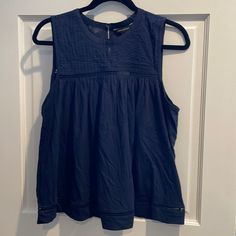 New With Tags This Is A Navy Sleeveless Blouse From Banana Republic Factory Size L Casual Cotton Tank Blouse, Blue Tank Vest Blouse, Sleeveless Cotton Tops For Daywear, Cotton Sleeveless Tops For Daywear, Blue Cotton Sleeveless Tank Top, Blue Cotton Sleeveless Top, Sleeveless Cotton Blouse For Vacation, Casual Sleeveless Blue Blouse, Blue Sleeveless Blouse For Day Out