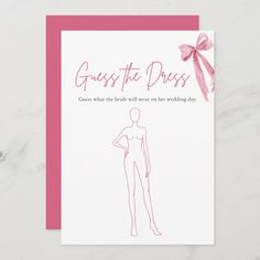 a card with the words guess to dress on it and a pink ribbon tied around it