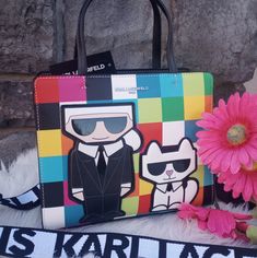 * Brand New Karl Lagerfeld Maybelle Satchel In "Multi Combo" * No Dust Bag * Measures 10"L X 8"H X 4.5"D * Vibrant Rainbow Colorblock Design With The Iconic Designer & His Cat Mascot (Slightly "Puffed" Up) * Pink, Blue, Green, Red, White, Yellow, Orange & Black "Checkerboard" * Detachable & Adjustable Nylon Logo "Karl Lagerfeld" Guitar Crossbody Strap * Exterior Snap Pocket + Interior Slide-In Pocket & Zip Pocket * Super Fun, Stylish & Fashionable Handbag! Modern Multicolor Spring Bags, Multicolor Handheld Satchel With Detachable Handle, Multicolor Top Handle Satchel, Multicolor Satchel With Handles For On-the-go, Multicolor Leather-handled Rectangular Satchel, Karl Lagerfeld Bags, Large Tote, Fashion Handbags, Karl Lagerfeld