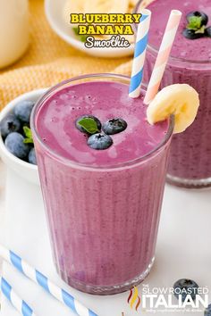 two glasses filled with blueberry banana smoothie