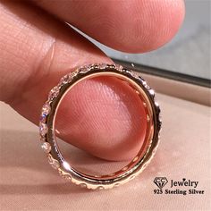 Metals Type: silverMetal Stamp: 925,SterlingOrigin: CN(Origin)Gender: WomenMain Stone: ZirconFine or Fashion: FineSetting Type: Tension SettingSide Stone: ZirconItem Type: RingsModel Number: RingShape\pattern: RoundStyle: TRENDYCertificateType: Third Party AppraisalRings Type: Wedding BandsOccasion: WeddingProduct Type: RingGender: Rings For WomenStyle: Trendy JewelryShape: RoundColor: White Gold ColorStone: Cubic ZirconiaStone Color: WhiteSize: 2.9mmOccasion: Wedding/Engagement/PartyBijoux Femm Gold Sparkling Crystal Ring, Elegant Rose Gold Sterling Silver Crystal Ring, Fine Jewelry Rose Gold Rings With Sparkling Stones, Rose Gold Cubic Zirconia Jewelry For Promise, Sparkling Rose Gold Fine Jewelry Rings, Rose Gold Sterling Silver Diamond Cut Ring, Rose Gold Sterling Silver Crystal Ring For Anniversary, Sparkling Rose Gold Jewelry With Round Cut, Sparkling Round Cut Rose Gold Jewelry