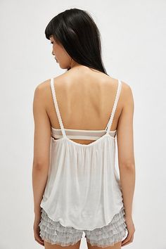 Featherweight fabric drapes effortlessly to form this flowy tank from Intimately. **Fit:** Flowy, full length **Features:** Semi-sheer featherweight fabrication, scoop neckline, skinny straps, picot trim, drapey style **Why We | On Air Tank Top by Intimately at Free People in White, Size: S White Camisole With Wide Straps For Summer, White Tank Top With Wide Straps For Spring, Sheer Camisole For Summer, Casual Sheer Tank Top For Summer, Sheer Sleeveless Camisole For The Beach, Sheer Camisole With Spaghetti Straps For Summer, Summer Sheer Camisole With Spaghetti Straps, Summer Sheer Camisole Tank Top, Summer Lounge Tank Top With Straps