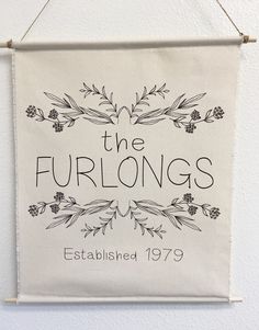 the furlongs established 1970 hanging sign