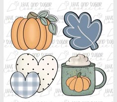 three pumpkins, two mugs and one heart cut outs on a white background