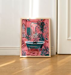 a bathroom scene with focus on the bathtub and wood flooring that has been painted pink