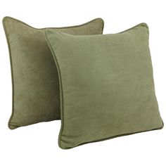 two green pillows sitting next to each other