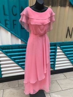 "1970s Carnation Pink Taffeta & Chiffon Maxi Dress. Featuring dreamy & floaty layered chiffon with a low back. Zipper at back of garment. Measurements: Bust: 32\"/33\" Waist: 25\" Hips: 36\"/37\" Length: 55\" Condition: Very good, vintage condition. Some scattered brown marks, thread pull on front skirt region. Condition reflected in price." Vintage Party Chiffon Dress, Fitted Vintage Chiffon Party Dress, Fitted Vintage Chiffon Dress For Party, Vintage Chiffon Summer Dress, Flowy Vintage Chiffon Dress, Vintage Pink Chiffon Dress, Vintage Chiffon Maxi Length Dress, Vintage Chiffon Maxi Dress For Party, Vintage Chiffon Maxi Dress