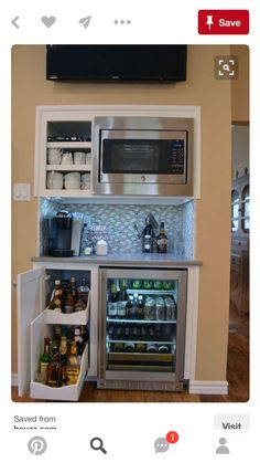 an open refrigerator and microwave combination in a kitchen