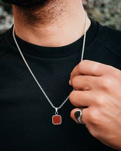 The Red Enamel pendant. Also available in 18K Gold.  DETAILS Pendant size: 1.5cm x 1.5cm  Chain styles: Figaro (3mm), Rope (2.5mm) Materials: Stainless Steel / 18K Gold PVD Plating, Red Enamel Necklace clasp: Lobster Hypoallergenic SIZING This chain is available in lengths: 20", 50.8cm  22", 55.8cm 24" 61cm  Model is wearing 22"  OUR GUARANTEE/ PROMISE We 100% guarantee your necklace will never fade, lose colour or tarnish. Wear in the shower, sea & to sleep. Our jewellery is 100% Nickel free so Red Jewelry With Polished Finish For Gift, Red Pendant Chain Jewelry, Red Pendant Necklace With Chain, Red Sterling Silver Necklace With Silver Chain, Red Jewelry With Adjustable Chain And Round Pendant, Red Necklace With Polished Finish As Gift, Red Polished Round Pendant Necklace, Red Necklace With Polished Finish For Gift, Red Sterling Silver Necklace With Adjustable Chain