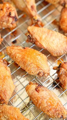 chicken wings on a cooling rack ready to be cooked in the oven or baked for dinner