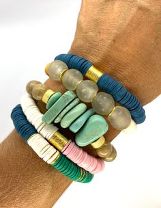 "This listing is for 1 bracelet made with Brown Wood beads and turquoise chip beads. My hand-beaded bracelets are made with stretch elastic which makes it comfortable and easy to wear. My bracelets are made to fit an average wrist size of 6.5\"-7\". Take a look around my shop for additional colors to add to your stack! The more the better!" Turquoise Stretch Bracelet With Wooden Beads Gift, Turquoise Wooden Beads Bracelet, Adjustable Turquoise Beaded Bracelets With Wooden Beads, Spiritual Turquoise Beaded Bracelets With Wooden Beads, Spiritual Turquoise Beaded Bracelet With Wooden Beads, Turquoise Beaded Bracelets With Wooden Beads For Healing, Bohemian Turquoise Stretch Bracelet With Heishi Beads, Bohemian Turquoise Heishi Beads Stretch Bracelet, Spiritual Turquoise Stretch Bracelet With Colorful Beads