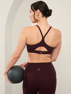 BEST FOR STUDIO: yoga + barre + pilates IMPACT: Light-impact workouts, best for A-C cups FEEL: Powervita fabric is buttery soft with support that feels like a gentle hug FAVE: Sleek racerback design provides distraction-free mobility and airflow Removable cups Designed for A-C cups IMPACT: For light-impact workouts. Supportive Activewear With Built-in Bra For Pilates, Fitted Sports Bra With Arch Support For Yoga, Supportive Functional Yoga Activewear, Supportive Functional Activewear For Yoga, Supportive Athleisure Sports Bra For Pilates, Supportive Functional Activewear For Pilates, Versatile Activewear For Pilates, Stretch Sports Bra With Light Support For Barre, Supportive Sweat Resistant Sports Bra For Yoga