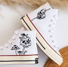 '' Custom White Converse Hight Tops Chuck Taylor 1970s Embroidered Mushrooms and Ghost and Skull, Gothic Embroidered Sneaker Custom, Gift for Him  '' 🍀 Price includes Converse Shoes and Floral Embroidery Designs as shown 🍀 🍀 Shoe Type: Converse 1970s 🍀 Shoe color: 1. White_1970s 1. DETAILS 🍀 You can send me your Converse, Vans, canvas shoes or I can buy them for you. Custom-ordered embroidered Vans and Converse shoes, please wait another 2-4 days. Each pair is hand embroidered to order, please make sure you put in the correct shoe size before you check out. The embroidery is meticulous and does not fade. 🍀 You will receive Vans and Converse shoes with floral embroidery designs as above. 2. PERSONAL EXPRESSION 🍀 Create your unique vibe by your own design of embroidery! In addition to Ghost Converse, Embroidered Converse High Tops, Converse Embroidery, Embroidered Vans, Converse 1970s, Embroidered Converse, Ghost Skull, Custom Converse, Personalized Shoes