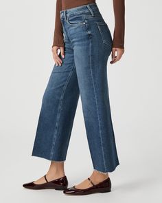 This modern high-waisted wide leg has an easy, relaxed fit and an ankle length silhouette. This pair is cut from our PAIGE VINTAGE denim in medium vintage-inspired wash with natural fading, lived-in details, and a raw hem. PAIGE VINTAGE takes all of the work out of breaking in your favorite pair of vintage jeans. We've combined the comfort of stretch with everything you love about authentic vintage denim to create super soft jeans that feel perfectly lived-in from the very first wear. | Anessa W Fall High Rise Medium Wash Wide Leg Pants, Fall Medium Wash High Rise Wide Leg Pants, Fall Medium Wash Cropped Wide Leg Pants, Chic Medium Wash Wide Leg Pants For Fall, High Rise Denim Blue Wide Leg Pants For Fall, Fall Cropped Wide Leg Pants In Medium Wash, Fall Medium Wash Mid-rise Wide Leg Pants, Medium Wash Wide Leg Cropped Jeans For Fall, Fall Medium Wash Wide Leg Cropped Jeans