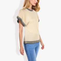 The Anna-Kaci Women's Cap Sleeve Knit Top with Contrast Striped Trim and Crew Neck is a chic and versatile addition to your casual wardrobe. Made from soft, breathable fabric, this top features stylish cap sleeves and a classic crew neck, providing a comfortable and flattering fit. The contrast striped trim adds a touch of modern flair, making it perfect for casual outings, work, or weekend get-togethers. Pair this versatile knit top effortlessly with jeans, skirts, or shorts for a polished and Cream Soft Knit Tops For Layering, Chic Cream Crew Neck Knit Top, Ribbed Beige Workwear Tops, Ribbed Beige Tops For Workwear, Beige Soft Knit Tops For Workwear, Beige Soft Knit Tops For Work, Beige Ribbed Tops For Work, Beige Ribbed Tops For Workwear, Cream Pointelle Knit Crew Neck Top