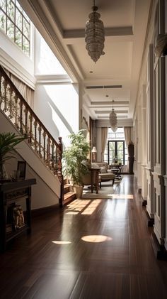 a long hallway with wooden floors and windows