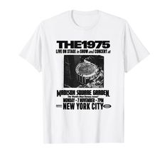 a white t - shirt with an image of the 1970 concert in new york city