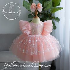 ♥ Introducing our exquisite pink sparkle tulle dress, a perfect blend of elegance and chic style that will make any young girl feel like a princess. This enchanting dress features a delightful bow on top, adding a touch of charm to its overall design. The dress is adorned with butterfly sleeves that gracefully flutter with every movement, enhancing its whimsical appeal. The three-layer tulle skirt creates a voluminous silhouette, while an additional layer of pink sparkle tulle adds a shimmering Elegant Pink Fairy Dress For Party, Princess Tutu Dress With Bow For Dress-up, Princess Style Tutu Dress With Bow For Dress-up, Party Princess Dress With Pink Bow, Princess Style Tulle Dress With Bow, Pink Tulle Dress With Bow, Pink Tutu Dress With Bow For Birthday, Party Tutu Dress With Pink Bow, Princess Style Tutu Dress For Birthday With Bow