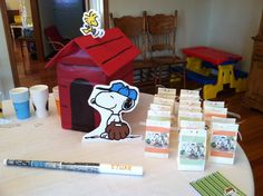 a table topped with lots of cards and place settings