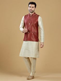 A gold zari brocade vest to pair with any kurta with statement button closures at the front. Occasion: Style this vest with pajama pants and a kurta for a welcome dinner or sangeet night, or style it with a any dress shirt and trousers for a sleek Indian wedding reception look! WASH CARE INSTRUCTIONS - Please Dry clean only. Slight color variation is possible due to digital photography. **Kurta & Pajama not included Traditional Sleeveless Bandhgala With Zari Work, Traditional Sleeveless Kurta With Zari Work, Sleeveless Bandhgala For Festivals, Brocade Nehru Jacket For Diwali Designer Wear, Bollywood Brocade Nehru Jacket For Festive Occasions, Festive Brocade Kurta For Puja, Diwali Brocade Nehru Jacket For Designer Wear, Diwali Designer Brocade Nehru Jacket, Gold Nehru Jacket For Festivals, Straight Kurta Style