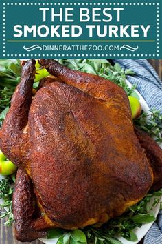 a roasted turkey on a plate with the title overlay reads, the best smoked turkey