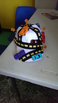 a hat sitting on top of a white table