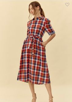 Navy plaid check midi dress with collared neck, buttoned closure, belted waistline, side pockets, short puff sleeves, and cuffed gingham check at the sleeve ends. 100% cotton. True to size, I am an 8/10 wearing a medium. Small 4-6Medium 8-10Large 12-14Extra Large 16-18 Garment Sewing, Midi Dress Fall, Fall Plaid, Gingham Check, Fall Dresses, Sewing Ideas, Puff Sleeves, Dress Accessories, Gingham