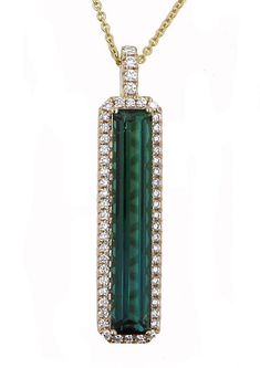 This tourmaline and diamond fashion pendant showcases a tourmaline stone with a total gem weight of 7.50 and a total carat weight of 0.55 all set in 14kt yellow gold. Adjustable chain included. N1084-BGT14Y Green Tourmaline Jewelry, Tourmaline Earrings, Tourmaline Pendant, Tourmaline Jewelry, Tourmaline Stone, Silver Gemstone Jewelry, Tourmaline Ring, Tourmaline Gemstone, Diamond Fashion