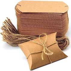 two brown bags tied together with twine