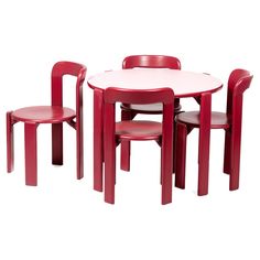 a red table and chairs with white top