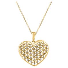 Make any day special with this gorgeous diamond heart pendant. This heart pendant is crafted from 14-karat yellow gold and features 37 single cut diamonds set in prong setting. H-I color I2 clarity and a high polish finish complete the Brilliant sophistication of this head-turning pendant. The total diamond weight 0.15 Carat and this Pendant suspends along with an cable chain. Heart Pendant Gold, Heart Pendant Diamond, Diamond Heart, Heart Of Gold, Cable Chain, White Diamond, Prong Setting, Heart Pendant, Diamond Cuts