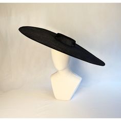 "One very wide straw hatinator base made of two layers of stiffened black sinamay that measures approximately 23.5\" (59.7cm) in diameter. It is a round shape with a flat crown that measures 5.5\" (14cm) across and 1.25\" (3cm) high.  The edges of the brim are finished in wired sinamay. PLEASE NOTE: This is NOT a ready to wear finished hat and will not stay on your head unless you add a head band or elastic to wear - these are sold separately in my shop. Add embellishments of your choice. A striking hat base! Lots of hat bases and millinery supplies listed in my shop   www.etsy.com/shop/apinkswan  ! Thanks for looking - feel free to convo me with any questions you may have." Cartwheel Hat, Hat Form, Style Analysis, Blank Hats, Millinery Supplies, Hat Base, Derby Hat, Fancy Hats, Diy Headband