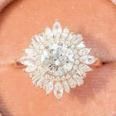 a close up of a ring with diamonds on it