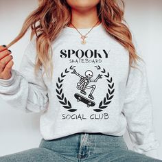 Gift For Skater Spooky Skeleton Sweatshirt Skateboarder Sweatshirt Hoodie Gifts Skateboard Social Club Crewneck Ghost Skateboard Hoodie Gift Thank you for supporting me and for visiting my store! PRODUCT Gildan Unisex Sweatshirt.These garments are made from polyester and cotton. High quality materials and digital printing are used in the production of all of our items.  HOW TO ORDER 1. Please review all the information provided before placing an order 2. Choose the color of your item from the fi Skeleton Sweatshirt, Spooky Skeleton, Skateboarder, Social Club, Spooky Season, Sweatshirt Hoodie, Digital Printing, Unisex Sweatshirt, San Jose