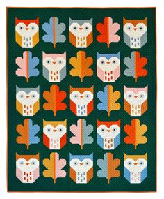 an owl quilt is shown with leaves on the front and back, which are multicolored