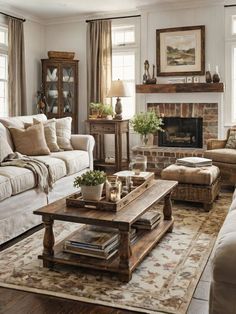 a living room filled with furniture and a fire place in the middle of a room