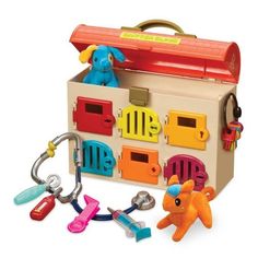 a wooden toy box with toys in it