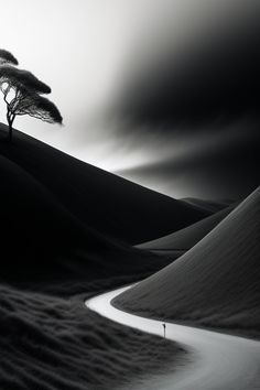 a lone tree stands in the middle of a desert with dark clouds and sand dunes