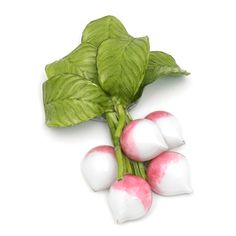 some pink and white vegetables are on a white surface