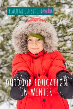 a young child wearing a red coat and hat with the words outdoor education in winter