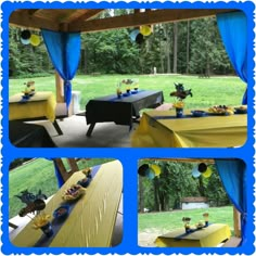 a table with yellow and blue cloths on it in the middle of a park