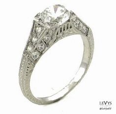 an antique style diamond engagement ring