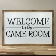 a sign that says welcome to the game room